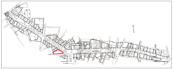 Figura 1. Plano de la Gran Vía con la planimetría antigua sobre la que se trazó. En rojo, la parcela del edificio.